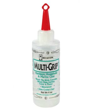 A bottle of Beacon Multi-Grip adhesive for hardware, household, and marine use.