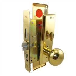A bright gold-colored door knob and latch assembly on a white background.