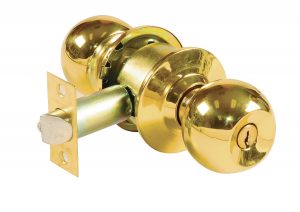 A shiny gold-colored door knob with lock mechanism, isolated on a white background.