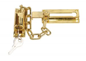 A gold-colored padlock with a chain and key on a white background.