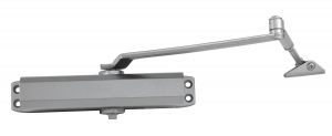 A silver door closer mechanism isolated on a white background.