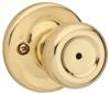 Gold-colored doorknob on a white background.