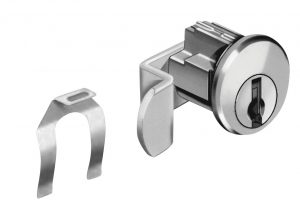 A metal cam lock and key with a separate latch component on a white background.