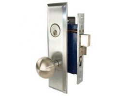 Stainless steel door handle and keyhole on a latch lock mechanism.