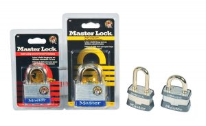 Two packaged Master Lock padlocks and two identical unlocked padlocks on a white background.