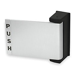 Stainless steel push door sign mounted on a white wall.