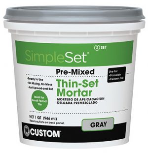 Container of SimpleSet pre-mixed thin-set mortar in gray color.