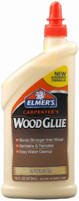 A bottle of Elmer's Carpenter's Wood Glue with red cap and label information.
