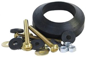 Assorted hardware with rubber washers, brass screws, and steel nuts on a white background.