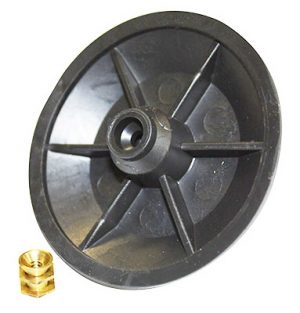 A black impeller component next to a small brass fitting on a white background.
