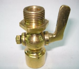 Brass gas valve with a lever handle on a white background.