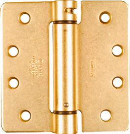 Brass door hinge isolated on a white background.