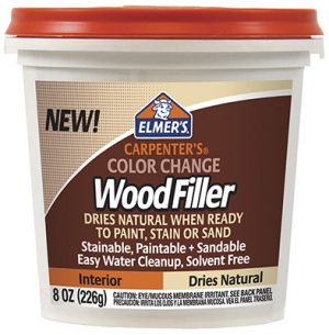 Container of Elmer's Carpenter's Color Change Wood Filler with red lid.