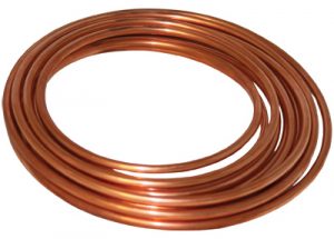 Coiled copper tubing with a shiny finish on a white background.