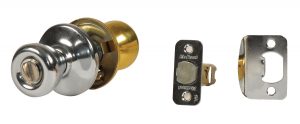 Doorknob with lock mechanism and separate keyhole plate on a white background.