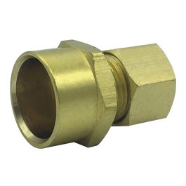 A brass compression fitting isolated on a white background.