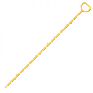 Yellow plastic swizzle stick for cocktails on a white background.