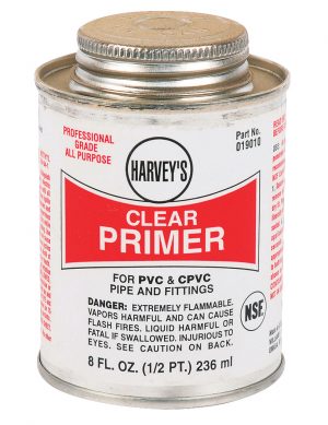 A can of Harvey's clear primer for PVC and CPVC pipes and fittings.