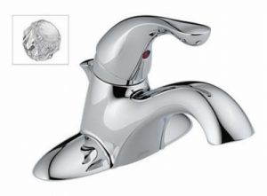 Chrome single-handle bathroom faucet with an inset diagram showing ball valve mechanism.