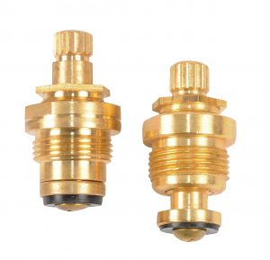 Two brass thermostat radiator valves isolated on a white background.