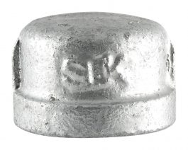 Close-up of a silver-colored metal cap with engraved text, isolated on a white background.