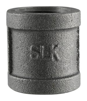 Close-up of a metal pipe coupling with stamped text on its side.