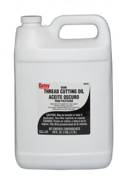 One-gallon container of Oatey dark thread cutting oil with a warning label.