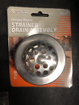 A chrome-plated tub strainer drain assembly in packaging.