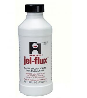 A bottle of Hercules Jel-Flux soldering paste with product information and warning labels.