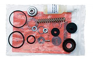 A variety of small mechanical parts packaged together, including springs, washers, and rings.