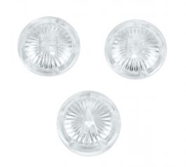 Three round, clear glass pebbles with starburst patterns on a white background.
