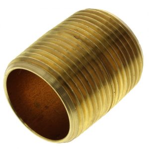 A cylindrical brass spring lying on its side against a white background.