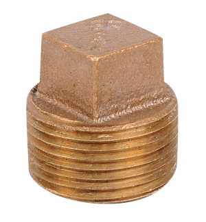 Hexagonal brass pipe cap on a white background.