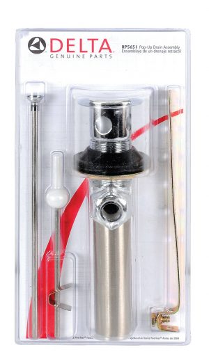 Packaged Delta pop-up drain assembly in clear plastic blister packaging.