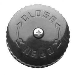 Close-up of a round metal cap with "CLOSE" and "OPEN" text and directional arrows embossed on it.