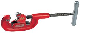 Red pipe wrench with a black handle isolated on a white background.
