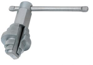 A metal tap and die tool for threading on a white background.