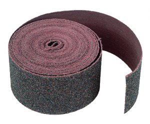 A roll of abrasive sandpaper on a white background.