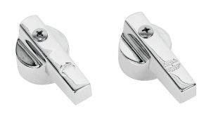 Two shiny metal whistle-style referee whistles on a white background.