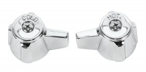 Two chrome faucet handles labeled "COLD" and "HOT" on white background.