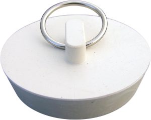 A white circular sink stopper with a metal ring on top, isolated on a white background.