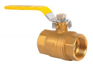 Brass ball valve with a yellow lever isolated on a white background.