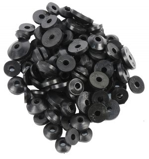 A pile of assorted black rubber grommets on a white background.