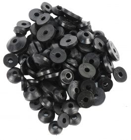 A pile of black rubber grommets isolated on a white background.