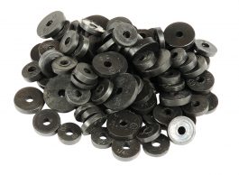 A pile of various-sized black metal washers on a white background.