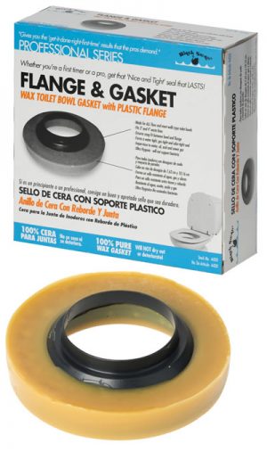 A wax toilet bowl gasket with plastic flange next to its packaging box.