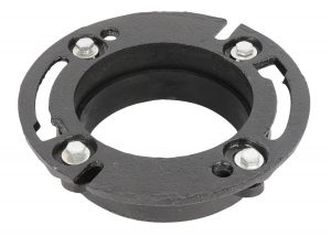 A black metal flange with four bolt holes and three mounted bolts.