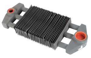 A gray metal heat sink with fins and two mounting brackets isolated on white.