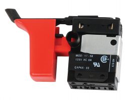 Red and black emergency stop switch for industrial machinery.