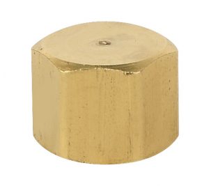 Brass cylindrical object with flat top and visible machining marks.